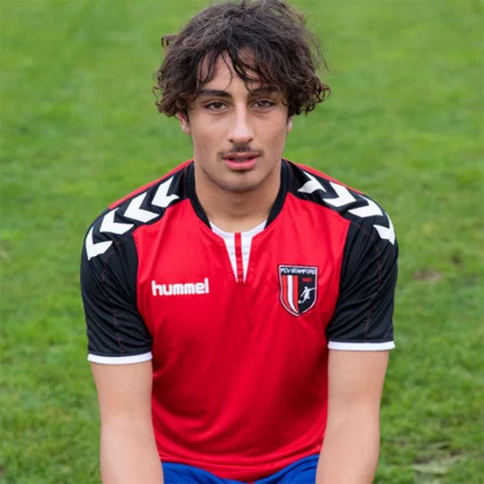 Image of a student in a football lineup. Learning flexible around activities
